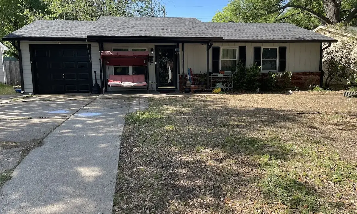 Asphalt Shingle Roof Repair crew at work on a residential roof in Bossier City